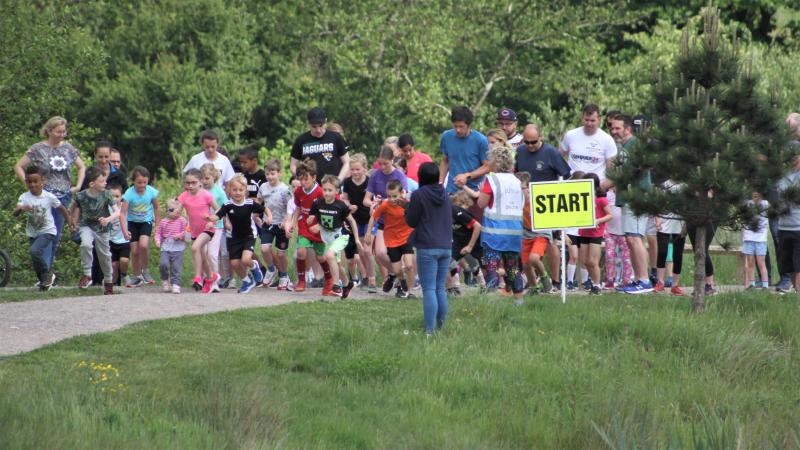 The children heading out of Cranbrook's 100th junior parkrun start line